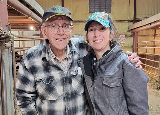 Photo of two S Diamond Angus team members